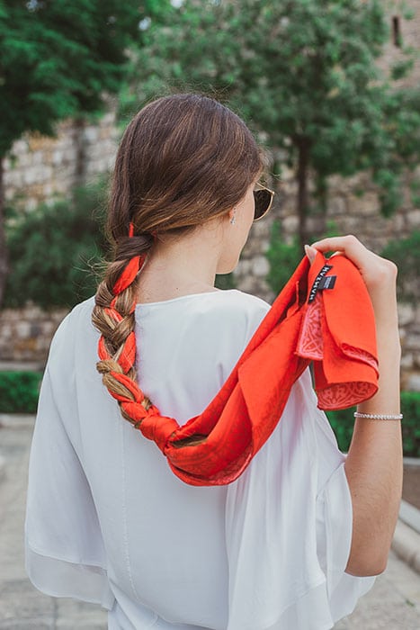 Woman with a braid made with a scarf