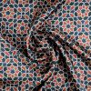 Detail of blue and red scarf with Moroccan tiles