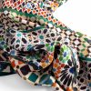 Detail of a multicolored scarf inspired by Islamic art.